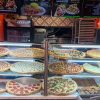 $1.50 NYC Hand Tossed Pizza ico