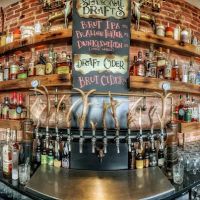 THE HUNTRESS whiskey, wings n’ other things ico