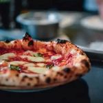 Discovering Pizza Restaurants That Feature International Toppings and Styles