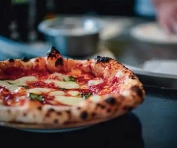 Discovering Pizza Restaurants That Feature International Toppings and Styles