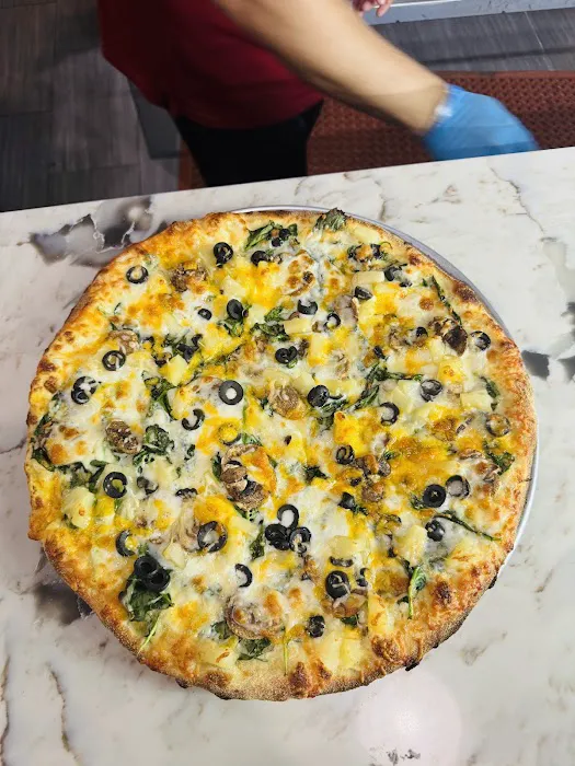 NURMOY PIZZA & RESTAURANT (HALAL) Picture 9
