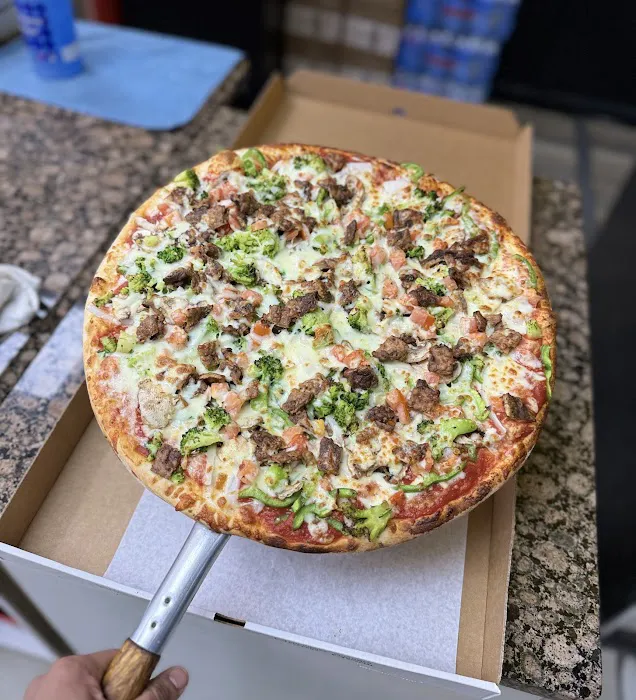 Jimmy Tomato’s And Bombay Curry Pizza Picture 4