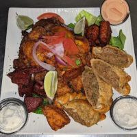 Que Rico Latin Cuisine ico