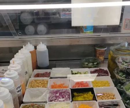 W E Deli Grocery Corp