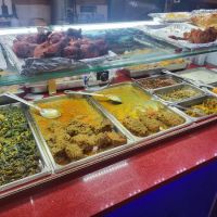 Radhuni Sweets & Restaurant ico