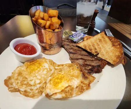 The Palm Bar & Grille