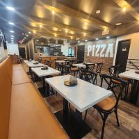 Singa's Famous Pizza & Grill Restaurant ico