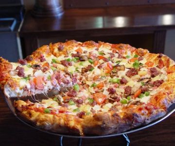 The Best Pizza Restaurants Near Me: Where to Get the Best Slice in Town | Dine Droop